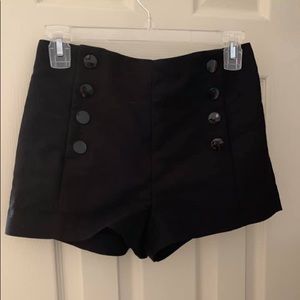 black buttoned shorts